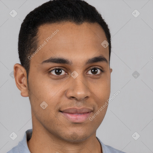 Joyful latino young-adult male with short  brown hair and brown eyes