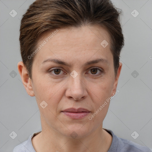 Joyful white adult female with short  brown hair and brown eyes