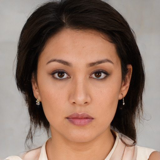 Neutral white young-adult female with medium  brown hair and brown eyes