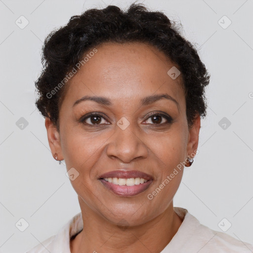 Joyful latino adult female with short  brown hair and brown eyes