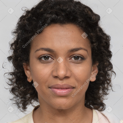 Joyful black young-adult female with medium  brown hair and brown eyes