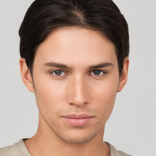 Neutral white young-adult male with short  brown hair and brown eyes