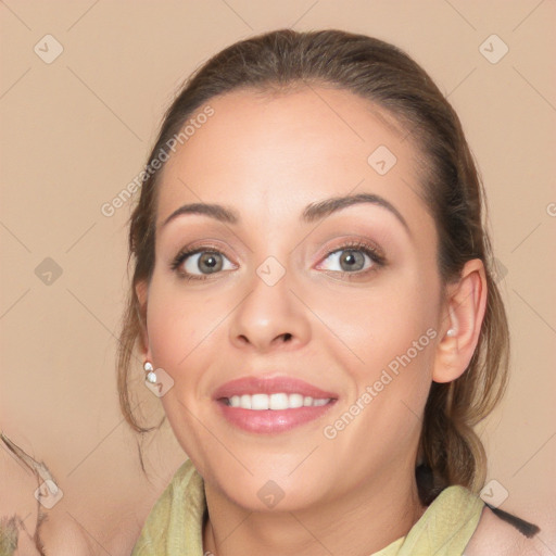 Joyful white young-adult female with long  brown hair and grey eyes