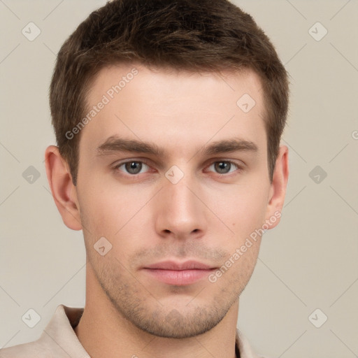 Neutral white young-adult male with short  brown hair and grey eyes