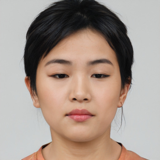 Neutral asian young-adult female with medium  black hair and brown eyes