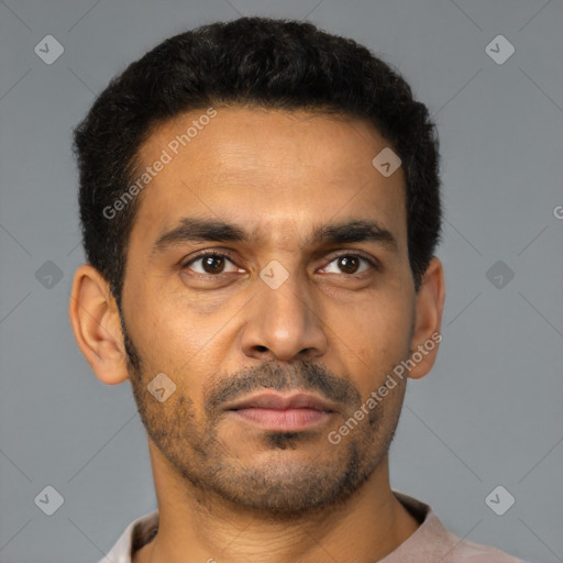Neutral latino young-adult male with short  black hair and brown eyes