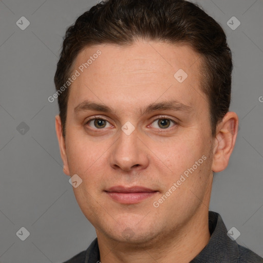 Joyful white young-adult male with short  brown hair and brown eyes