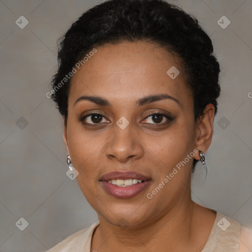 Joyful black young-adult female with short  brown hair and brown eyes