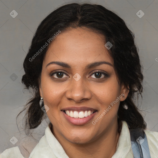 Joyful black young-adult female with medium  brown hair and brown eyes