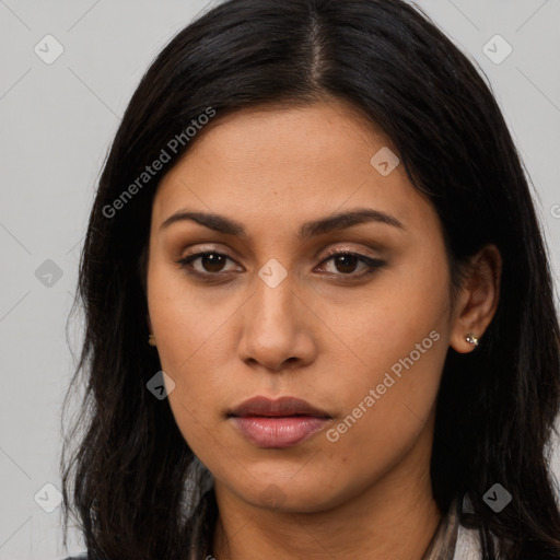 Neutral latino young-adult female with long  brown hair and brown eyes