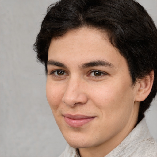 Joyful white adult female with medium  brown hair and brown eyes