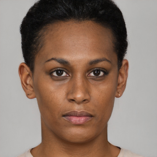 Neutral black young-adult female with short  brown hair and brown eyes