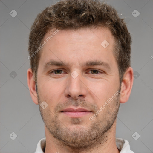 Neutral white young-adult male with short  brown hair and brown eyes