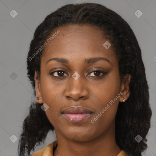 Joyful black young-adult female with medium  black hair and brown eyes