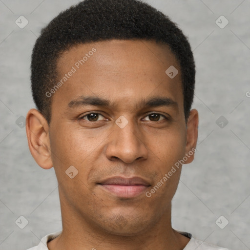 Joyful latino young-adult male with short  brown hair and brown eyes