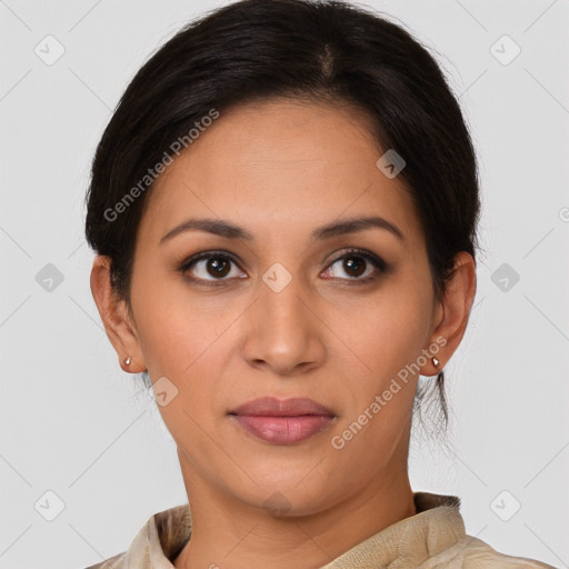 Joyful latino young-adult female with short  brown hair and brown eyes