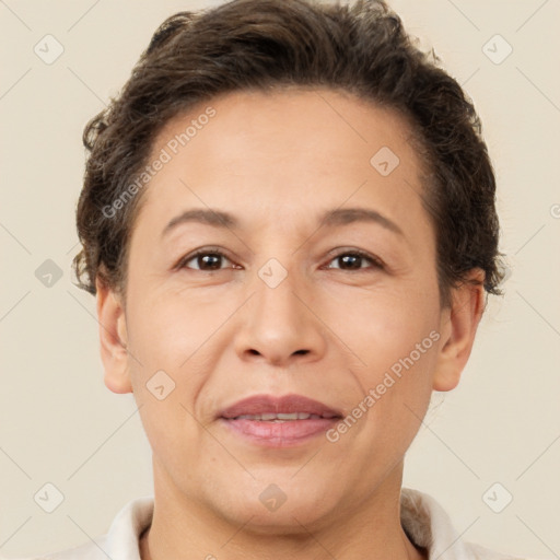 Joyful white adult female with short  brown hair and brown eyes