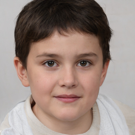 Joyful white child female with short  brown hair and brown eyes