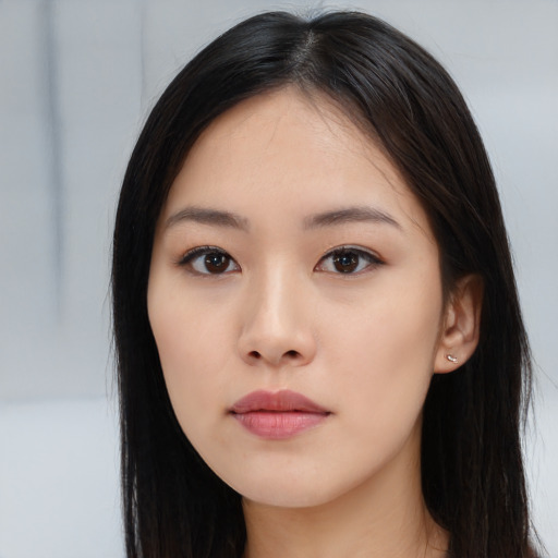 Neutral white young-adult female with long  black hair and brown eyes