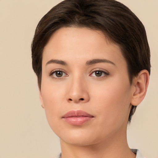 Neutral white young-adult female with short  brown hair and brown eyes