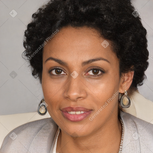 Joyful black young-adult female with long  brown hair and brown eyes