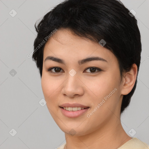 Joyful asian young-adult female with short  black hair and brown eyes