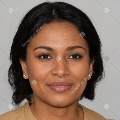Joyful black young-adult female with medium  brown hair and brown eyes