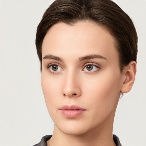 Neutral white young-adult female with short  brown hair and brown eyes