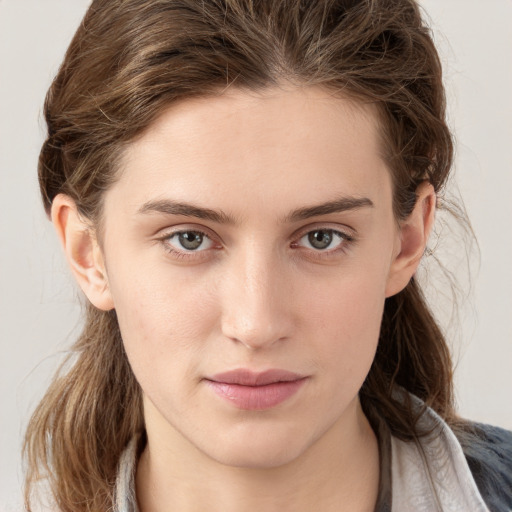 Neutral white young-adult female with medium  brown hair and grey eyes