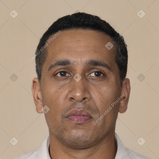 Neutral black adult male with short  black hair and brown eyes