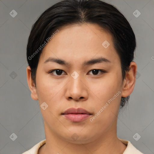 Joyful asian young-adult female with short  brown hair and brown eyes