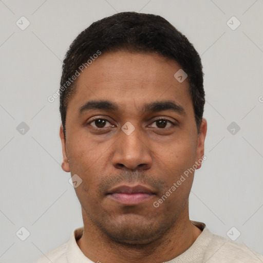 Neutral latino young-adult male with short  black hair and brown eyes