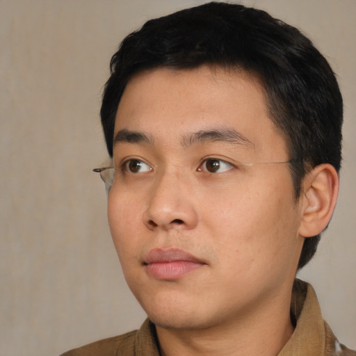 Neutral asian young-adult male with short  black hair and brown eyes