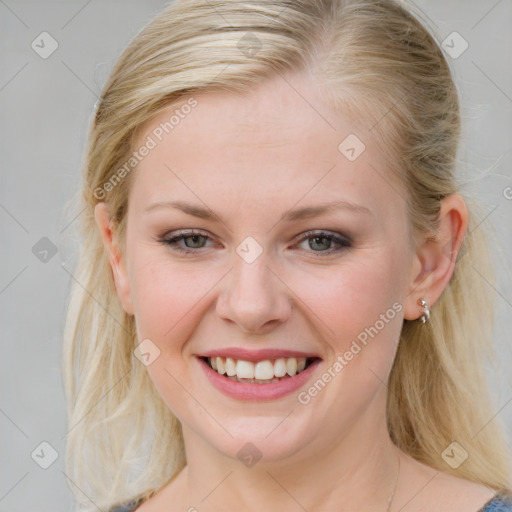 Joyful white young-adult female with medium  brown hair and blue eyes