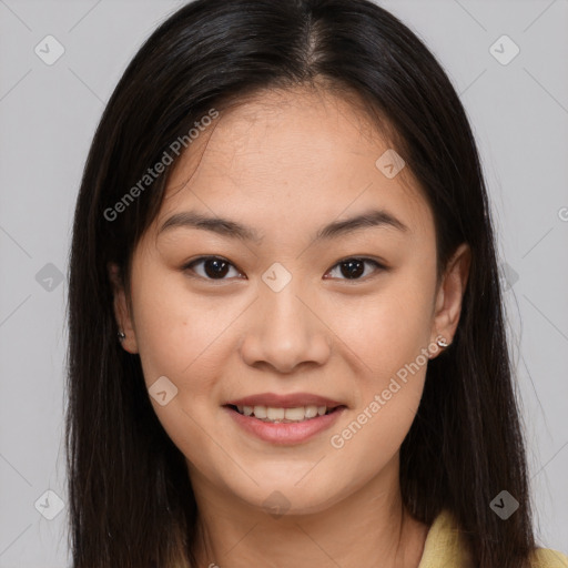 Joyful asian young-adult female with long  brown hair and brown eyes