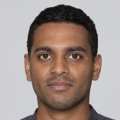 Neutral black young-adult male with short  black hair and brown eyes