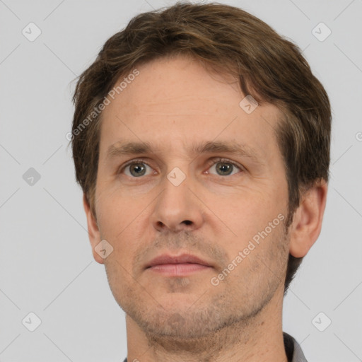 Neutral white adult male with short  brown hair and brown eyes