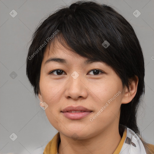 Joyful asian young-adult female with medium  brown hair and brown eyes