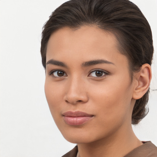 Neutral white young-adult female with short  brown hair and brown eyes