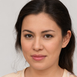 Joyful white young-adult female with medium  brown hair and brown eyes