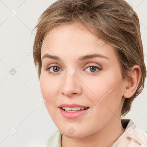 Joyful white young-adult female with medium  brown hair and blue eyes