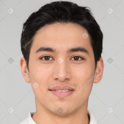 Joyful asian young-adult male with short  brown hair and brown eyes