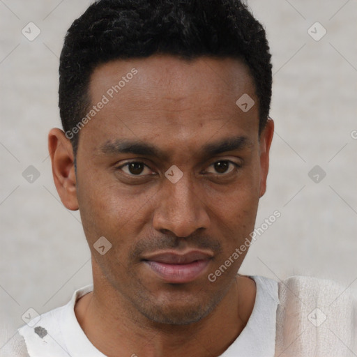 Neutral latino young-adult male with short  black hair and brown eyes