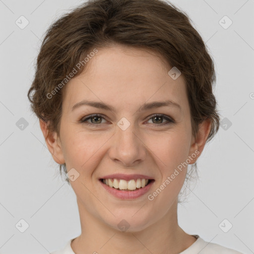 Joyful white young-adult female with short  brown hair and green eyes