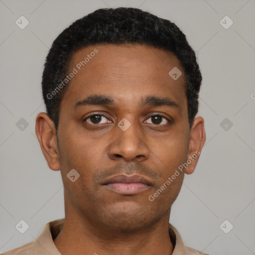 Neutral latino young-adult male with short  black hair and brown eyes