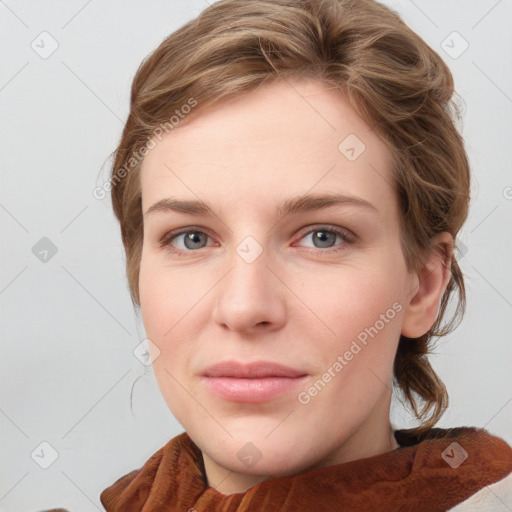 Joyful white young-adult female with medium  brown hair and blue eyes