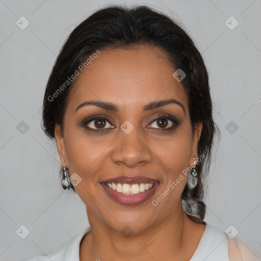 Joyful black young-adult female with medium  brown hair and brown eyes