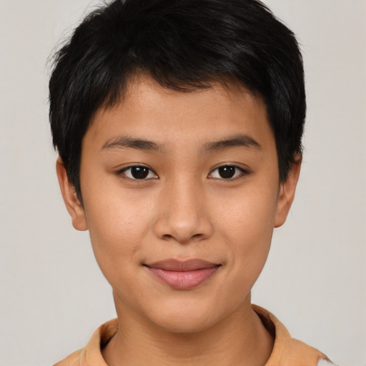 Joyful asian young-adult female with short  brown hair and brown eyes