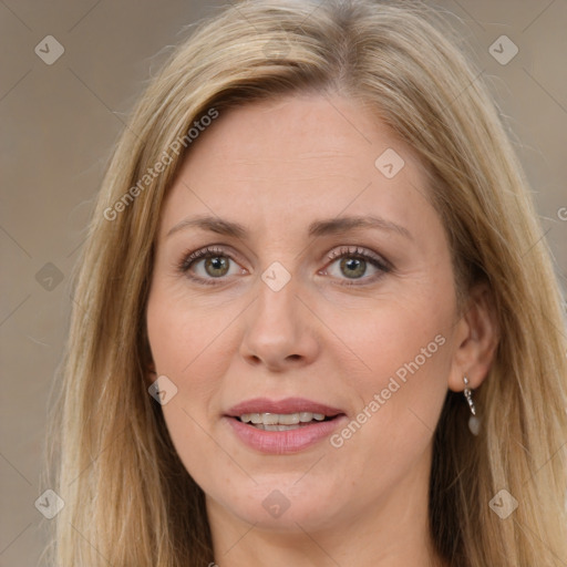 Joyful white adult female with long  brown hair and brown eyes