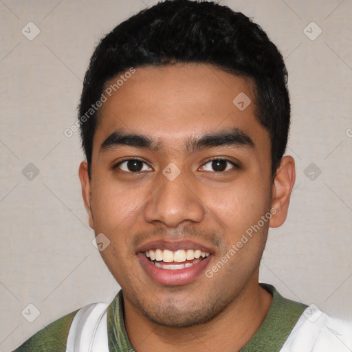 Joyful latino young-adult male with short  black hair and brown eyes